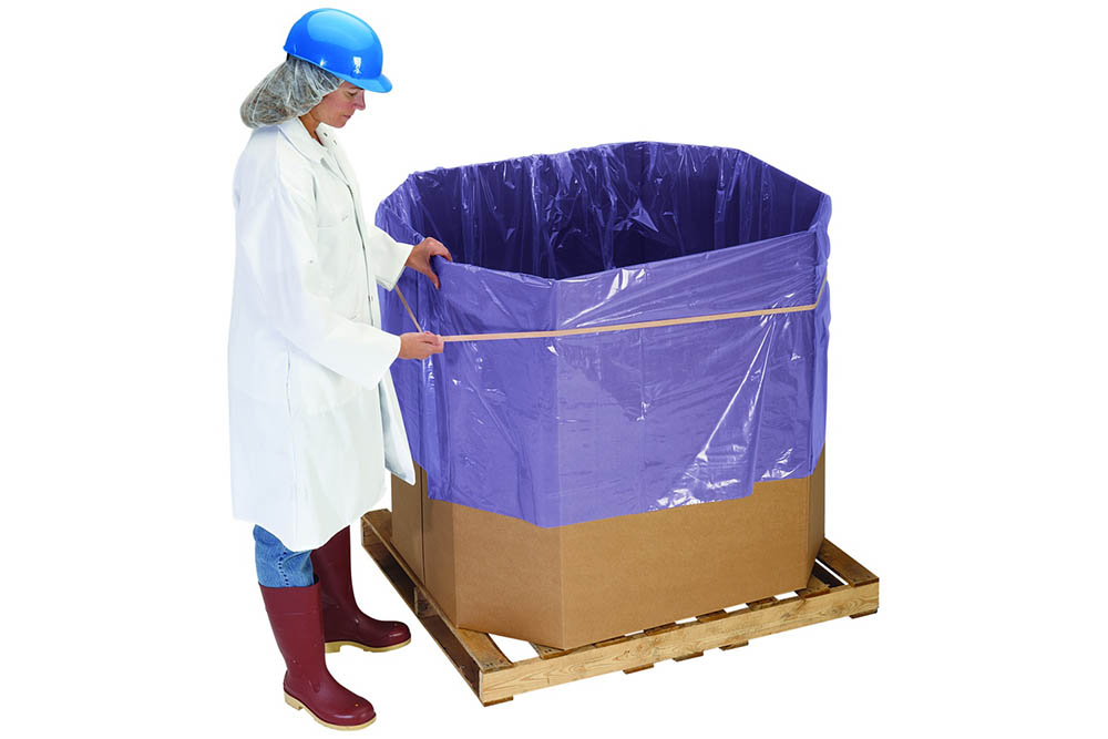 corrugated box lined with protective wrap purple in color