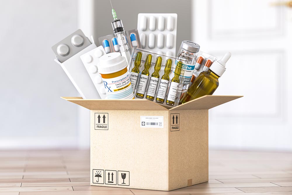 open cardboard box with medicines and healthcare medication.