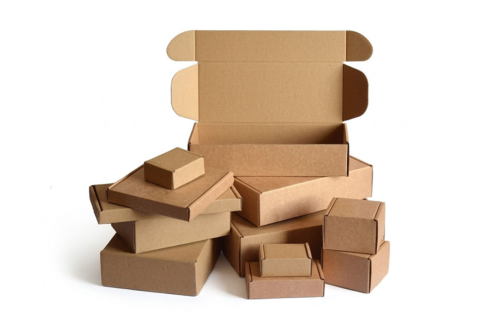assortment of die cut corrugated cardboard boxes