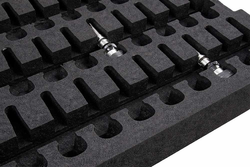 black cushioning dunnage protecting auto parts