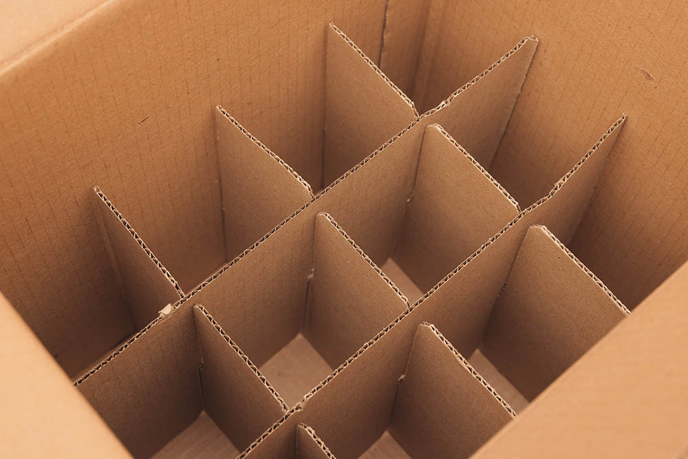 a cardboard box equipped with dividers designed specifically for organized storage solutions