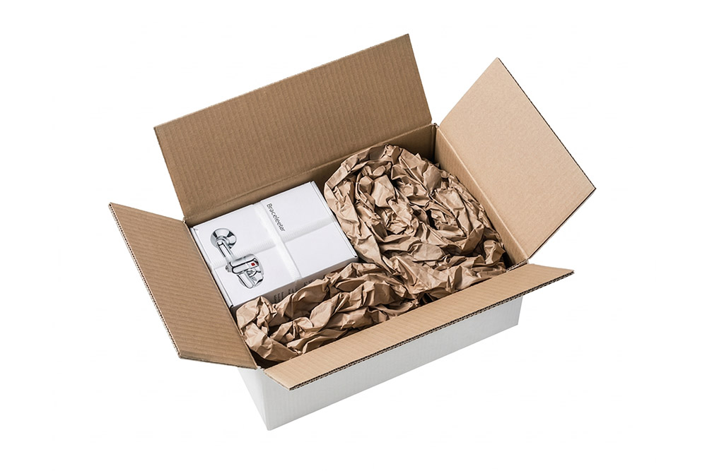 cardboard box with cushioning materials inside of it