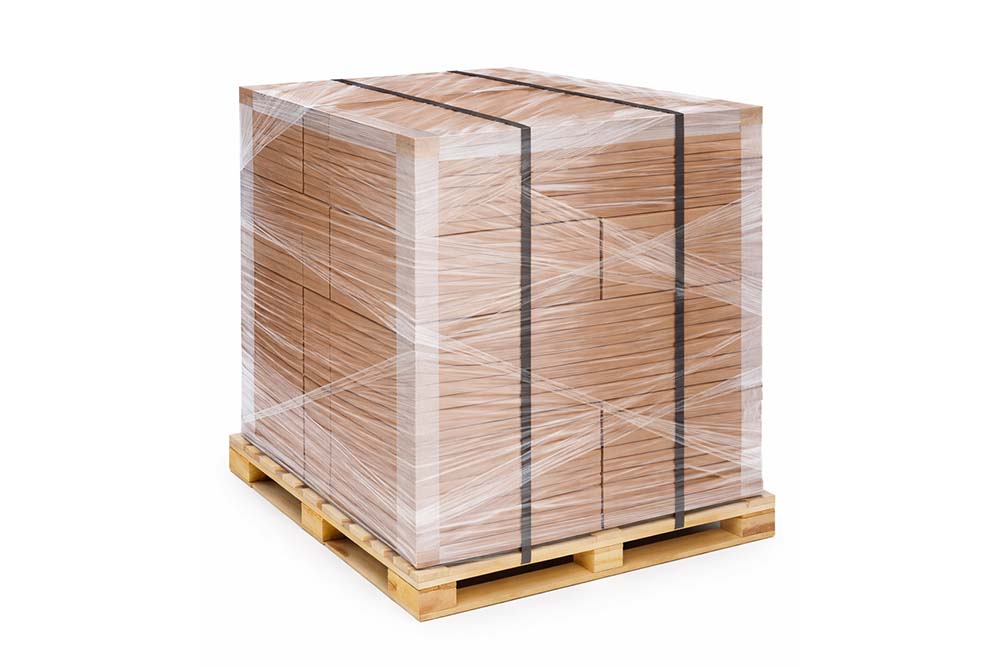 pallet with cardboard boxes secured with stretch wrap