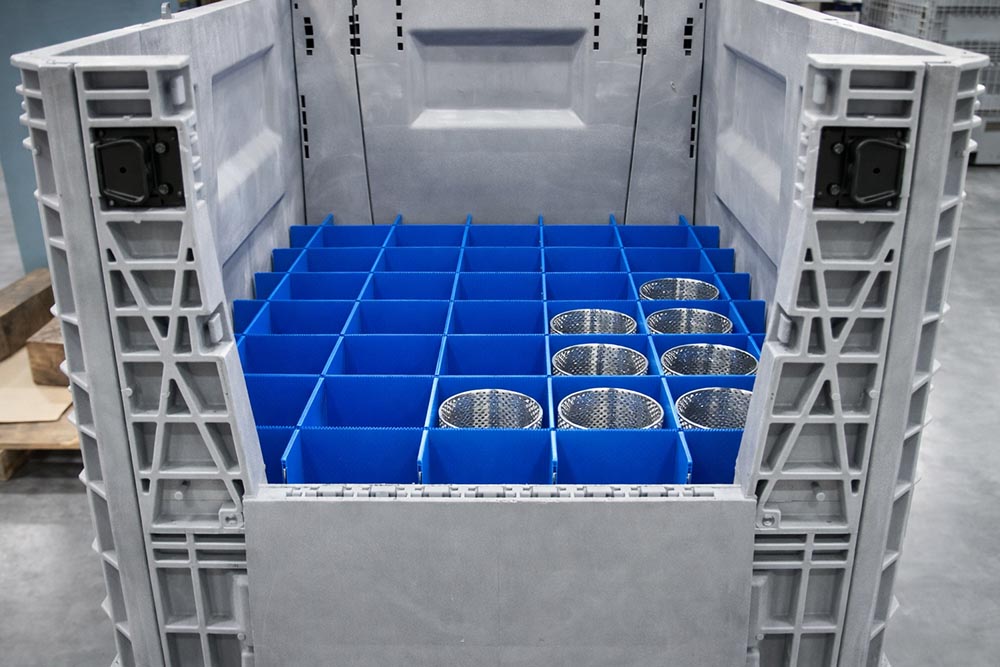 partitioned container for automotive parts